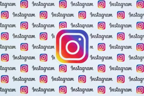 Instagram pattern printed on paper with small instagram logos and inscription Stock Photos