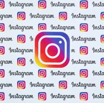 Instagram pattern printed on paper with small instagram logos and inscription Stock Photos