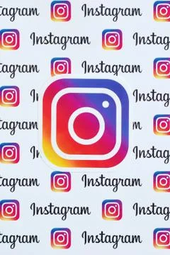 Instagram pattern printed on paper with small instagram logos and inscription Stock Photos