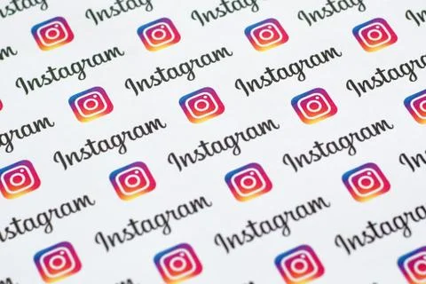 Instagram pattern printed on paper with small instagram logos and inscription Stock Photos
