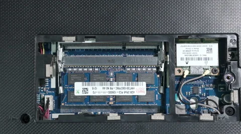 Install memory into a laptop Stock Footage 57272021