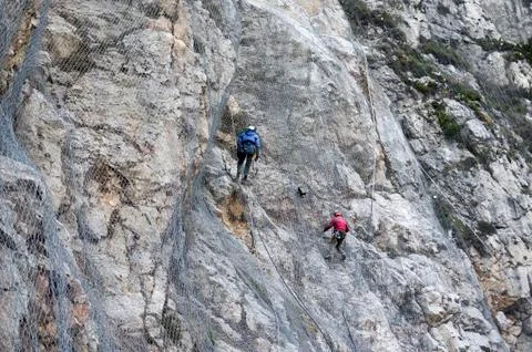 Installation of active galvanized wire rope mesh system Stock Photos