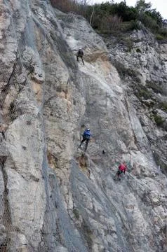 Installation of active galvanized wire rope mesh system Stock Photos