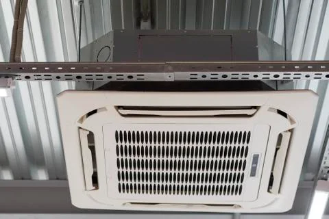 Installation of air conditioning on the ceiling Stock Photos