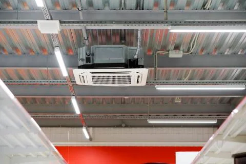 Installation of air conditioning on the ceiling Stock Photos