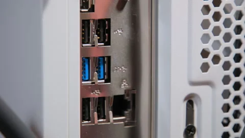 Installation and extraction USB flash memory in a personal computer. Close up Stock Footage 268292401
