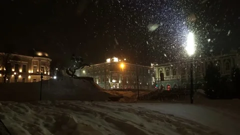 Installation of an artificial Christmas tree street view snowfall Stock Footage 226392619
