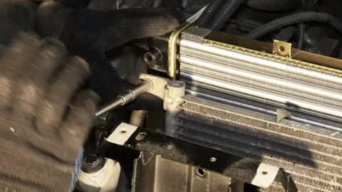 Installation of an automobile radiator. Stock Footage 204161022