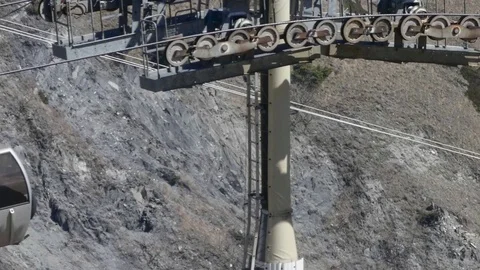 Installation of the cable car that leads tourists to a deep valley bel Stock Footage 71048708