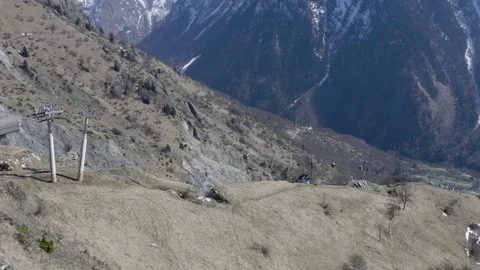 Installation of the cable car that leads tourists to a deep valley bel Stock Footage 71048778