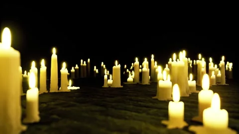 Installation of candles producing consistent glow and artistic rhythm pattern Stock Footage 342428863