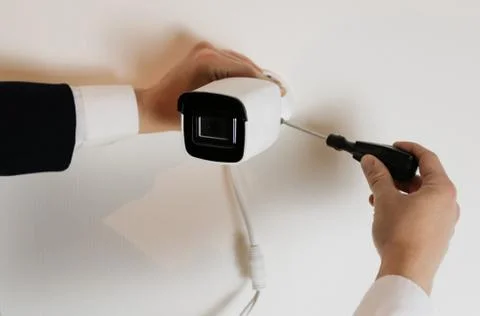 Installation of CCTV camera for home security. Videcam, smart home technology Stock Photos