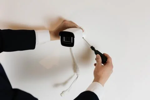 Installation of CCTV camera for home security. Videcam, smart home technology Stock Photos