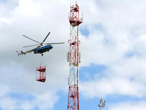 Installation of cell tower by helicopter Stock Photos