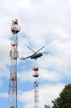 Installation of cell tower by helicopter Stock Photos