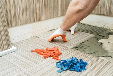 Installation of ceramic tiles. Stock Photos