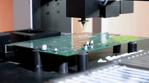 Installation of components on the circuit Board with the robot manipulator Stock Footage 48835220