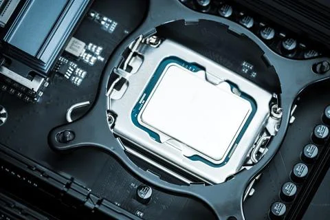 Installation of Computer CPU on a Motherboard Close-Up Stock Photos