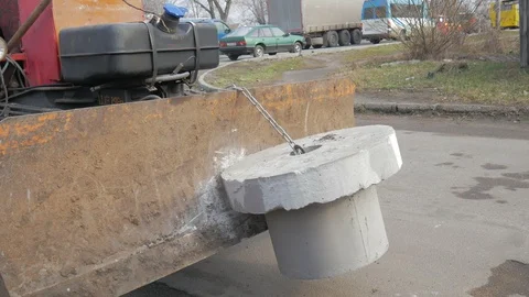 Installation of covers of cable shafts. Using an excavator tractor. Stock Footage 126896944