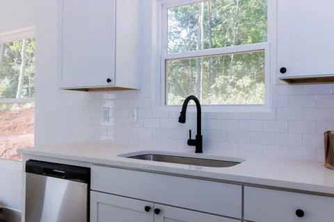 Installation custom modular kitchen cabinets in a new home Stock Photos