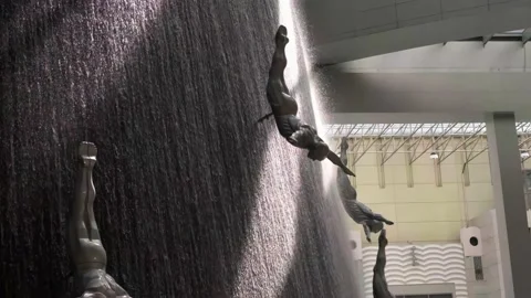 Installation of divers in dubai mall, dubai mall Stock Footage 235937630