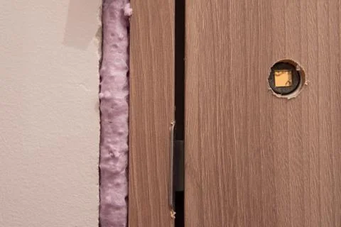Installation of doors using polyurethane foam mounting Stock Photos