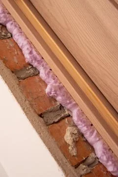 Installation of doors using polyurethane foam mounting Stock Photos