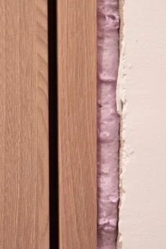 Installation of doors using polyurethane foam mounting Foto stock