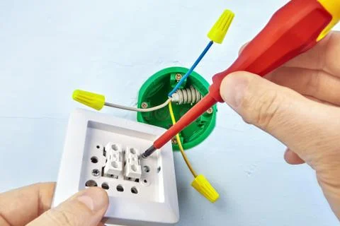Installation of double light switch. Stock Photos