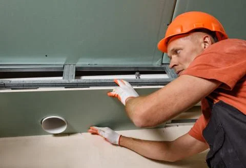 Installation of drywall. Stock Photos