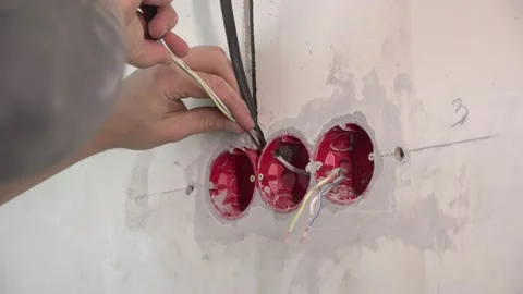 Installation of electrical cable and install sockets in the apartment Stock Footage 233736535