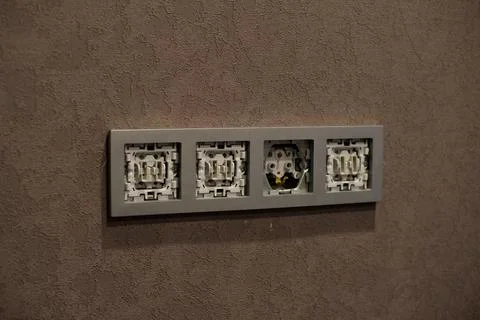 Installation of electrical outlets in the interior after a beautiful repair Stock Photos