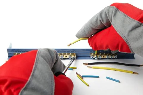 Installation electrical wire with terminal block. Electrician in Stock Photos