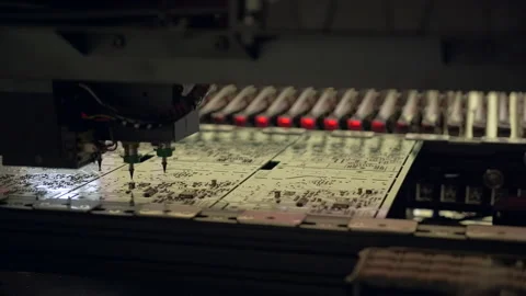 Installation of electronic components on a printed circuit board. Stock Footage 234141138
