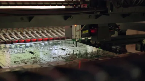 Installation of electronic components on a printed circuit board. Stock Footage 234142704