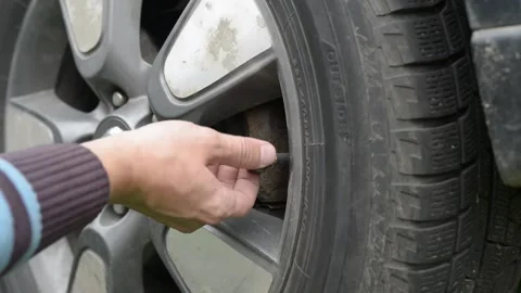 Installation of an electronic tire pressure sensor Stock Footage 218815659