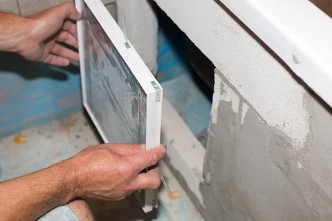Installation Empty space for shelf under the bath. Maintenance repair renov.. Stock Photos