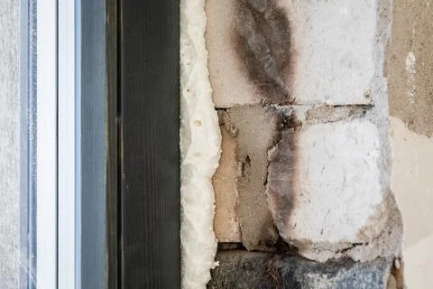 Installation of energy efficient windows. Mounting foam Stock Photos