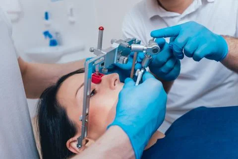 Installation of the face-bow. Functional diagnostics. Dental technology 스톡 사진