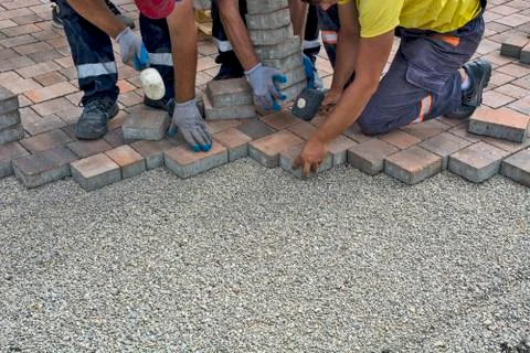Installation of floor bricks Stock Photos