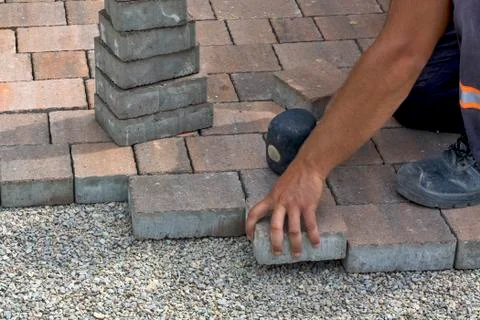 Installation of floor bricks Stock Photos