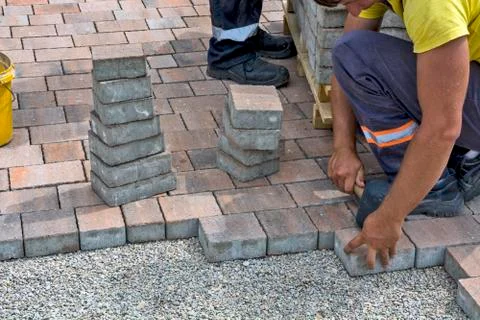 Installation of floor bricks Stock Photos