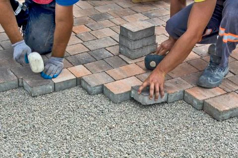 Installation of floor bricks Stock Photos