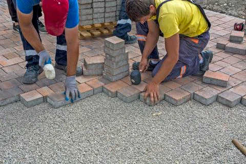 Installation of floor bricks Stock Photos