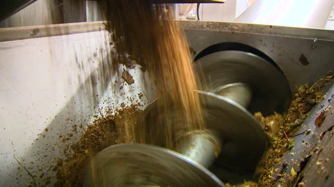 Installation for grinding apples. Twisted drill grinds apples. Closeup view Video stock 153924250