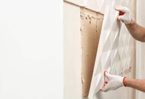 Installation of gypsum 3D panel. Stock Photos