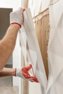 Installation of gypsum 3D panel. Stock Photos