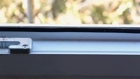 Installation of heat-insulating liner. Window mounting. Stock-Footage 86374413