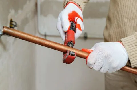 Installation of heating from copper pipes. Stock Photos