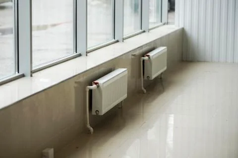 The installation of the heating system in a large room Stock Photos